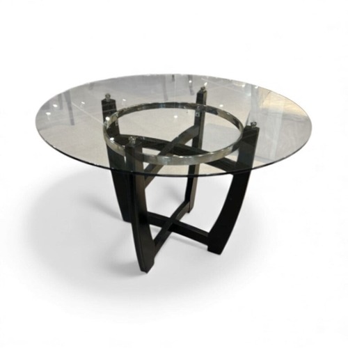 Used Modern Round Glass Top W Wooden Base Dining Table for sale on AptDeco