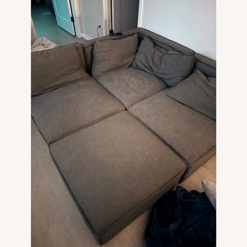 Used Tyson Grey 4 Piece Modular Sofa for sale on AptDeco