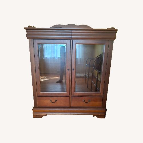 Used Broyhill Furniture Dark Brown Wood Armoire for sale on AptDeco