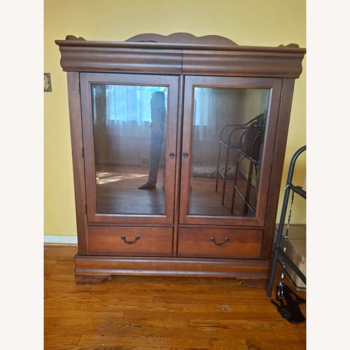 Used Broyhill Furniture Dark Brown Wood Armoire for sale on AptDeco
