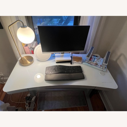 Used Light Gray Metal Standing Desk for sale on AptDeco