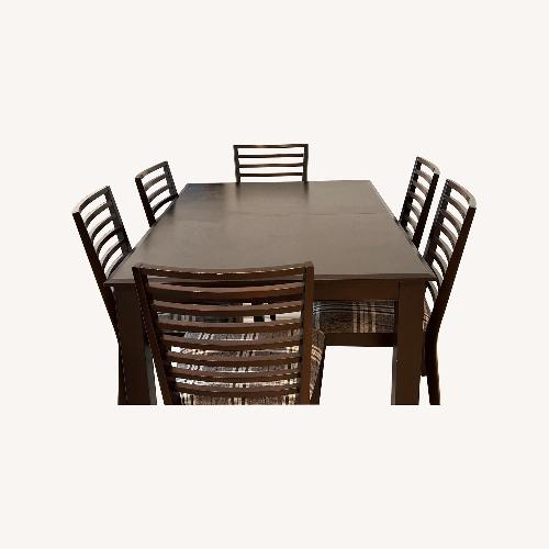 Used Canadel Dark Brown Wood Dining Set for sale on AptDeco