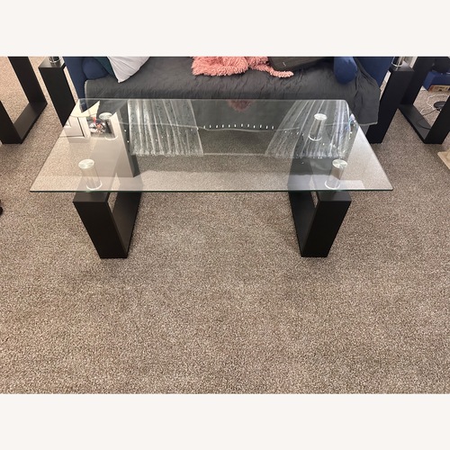 Used Crate & Barrel Dark Brown Glass Coffee Table for sale on AptDeco