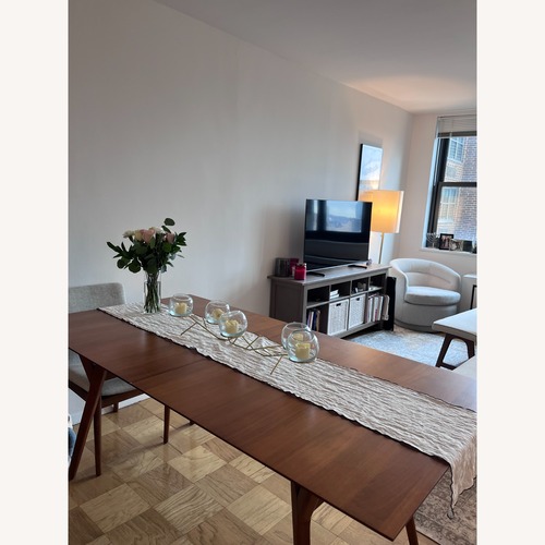 Used West Elm Mid-Century Wood Dining Table for sale on AptDeco