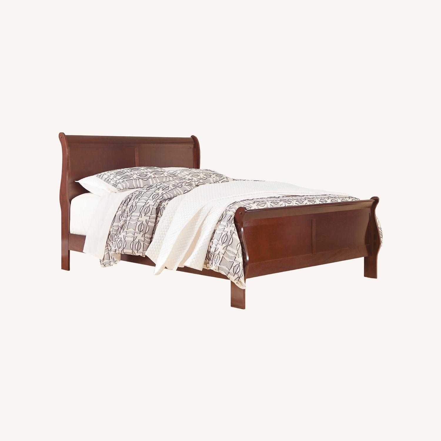 Ashley Furniture Dark Brown Wood Queen Bed - image-0