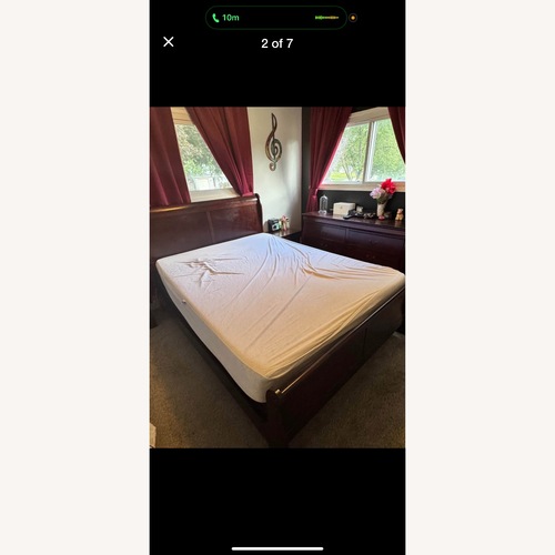 Used Ashley Furniture Dark Brown Wood Queen Bed for sale on AptDeco