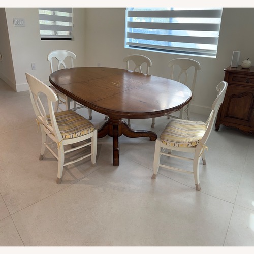 Used Pottery Barn Wood Table + 6 Chairs for sale on AptDeco