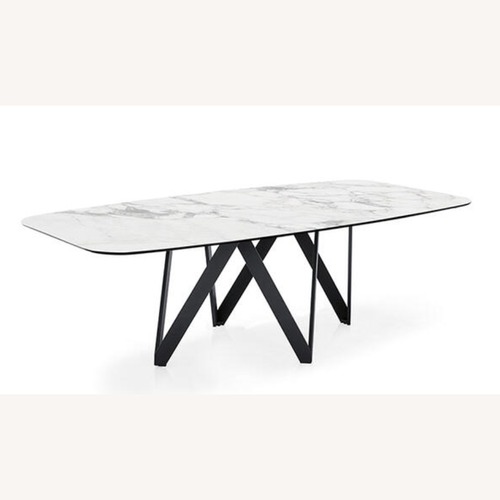 Used Calligaris Cartesio White Marble Dining Table for sale on AptDeco