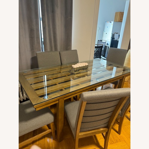 Used Glass Dining Table With 6 Chairs  for sale on AptDeco