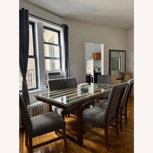 Used Glass Dining Table With 6 Chairs  for sale on AptDeco
