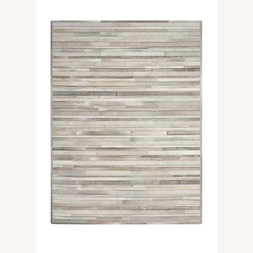 Used Calvin Klein Home Prairie Area Rug for sale on AptDeco