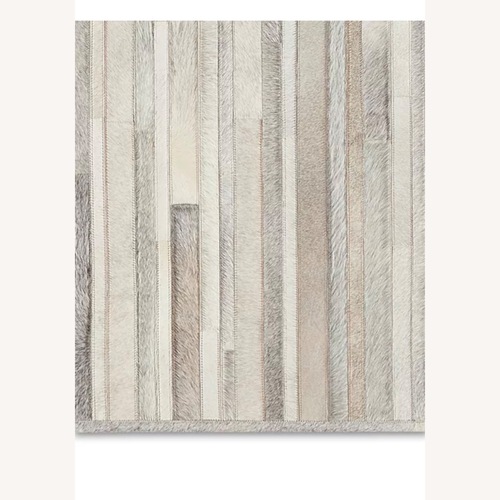 Used Calvin Klein Home Prairie Area Rug for sale on AptDeco