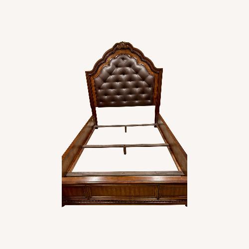 Used Ashley Furniture Dark Brown Wood Queen Bed for sale on AptDeco