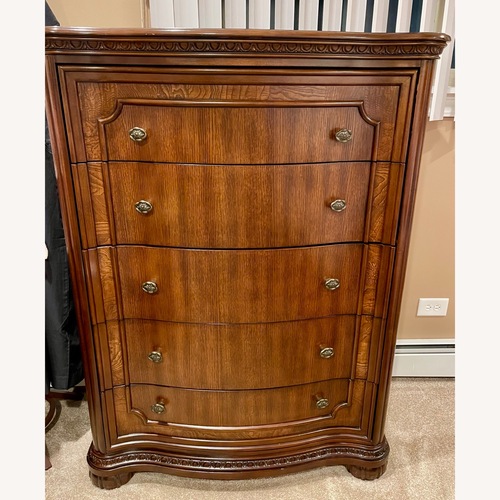 Used Ashley Furniture Dark Brown Drawer Chest for sale on AptDeco