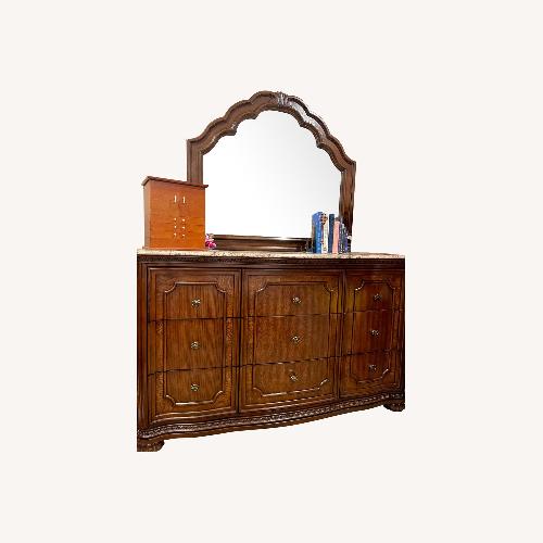 Used Ashley Furniture Dark Brown Wood Dresser for sale on AptDeco