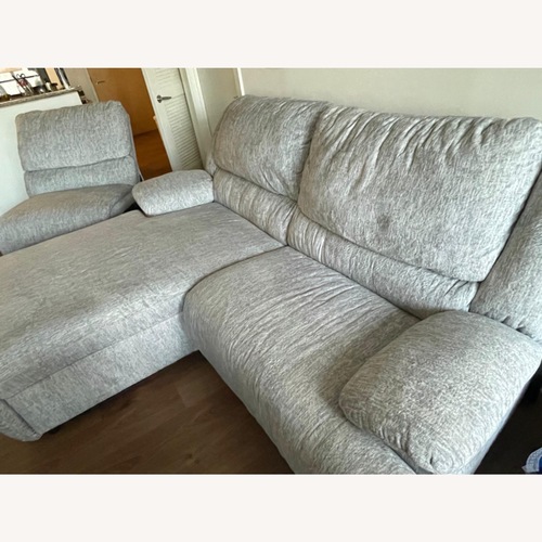 Used Ashley Furniture Mcclelland Light Gray 3+ Piece Sectional for sale on AptDeco