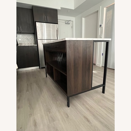 Used Home Depot Dark Brown Wood Kitchen Island for sale on AptDeco