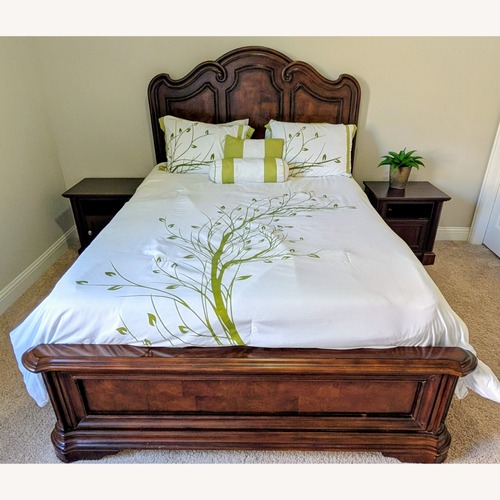 Used Ashley Furniture Dark Brown Wood Queen Bed for sale on AptDeco