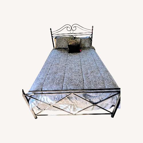 Used Elegant Wrought Iron Queen Bed Frame for sale on AptDeco