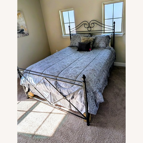 Used Elegant Wrought Iron Queen Bed Frame for sale on AptDeco