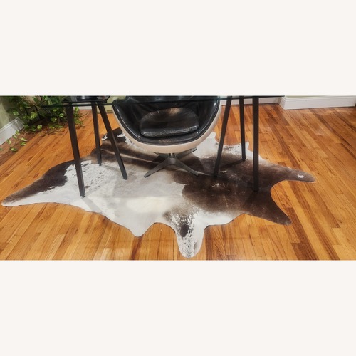 Used Rawhide Area Rug for sale on AptDeco