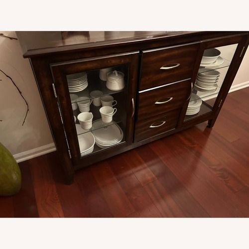 Used Raymour & Flanigan Dark Brown Dining Set for sale on AptDeco