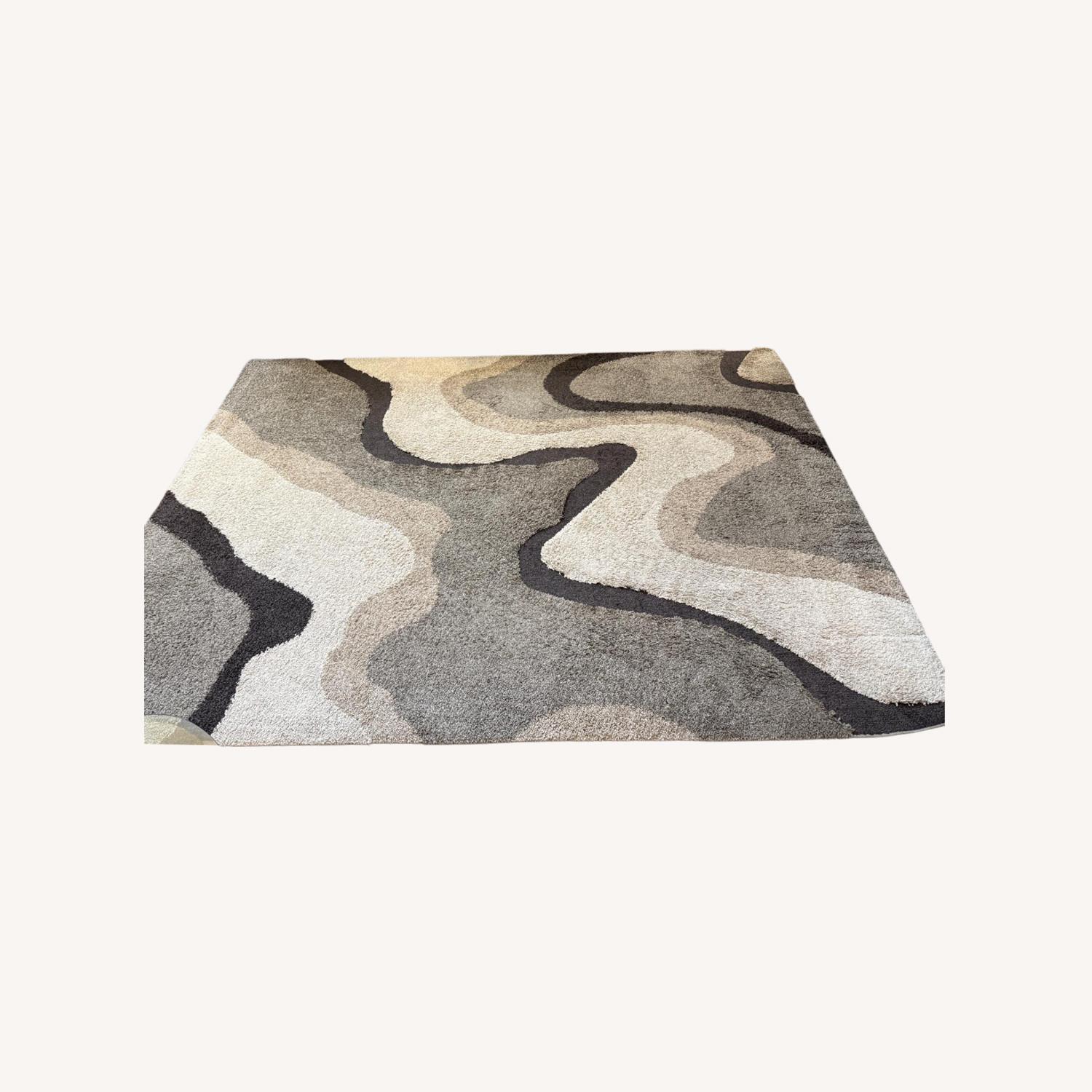 Rooms To Go Tetsu Light Brown Area Rug 7' x 10' - image-0