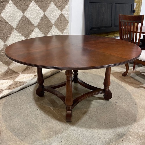 Used Hansen Round Wood Pie Cut Dining Table for sale on AptDeco