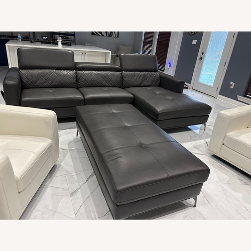 Used 2 Pc Sectional with Storage Ottoman  for sale on AptDeco