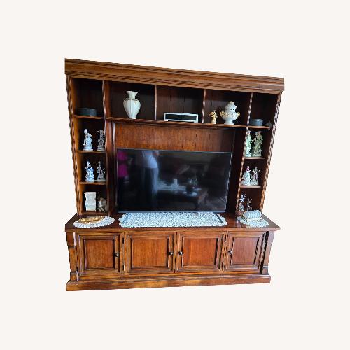 Used Dark Brown Wood Wall Unit for sale on AptDeco