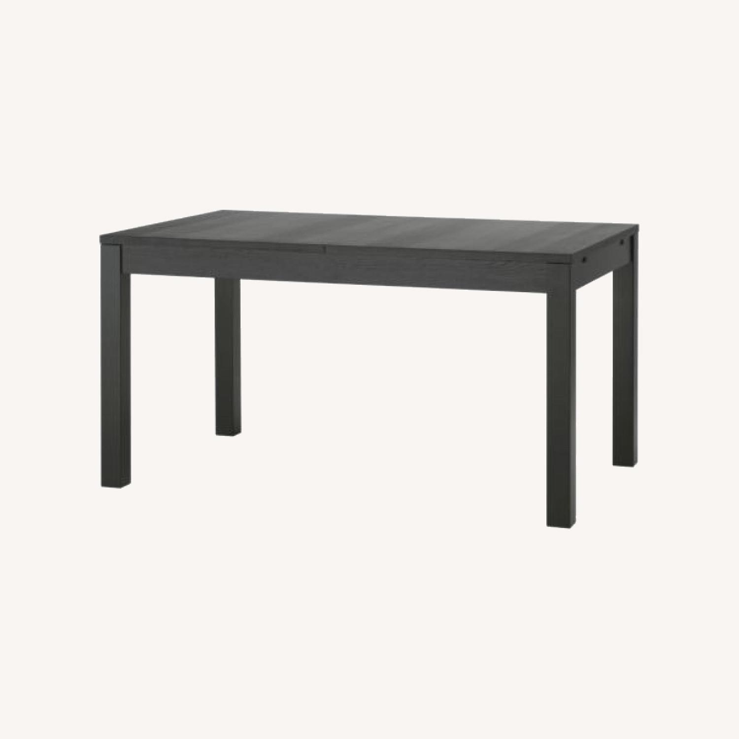 IKEA Bjursta Black Wood Dining Table - image-0