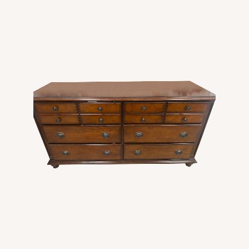 Used Dark Brown Wood Dresser for sale on AptDeco