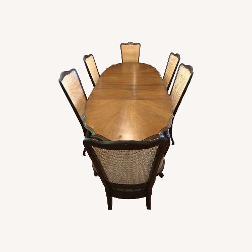 Used Vintage/Antique Dark Brown Wood Dining Set for sale on AptDeco