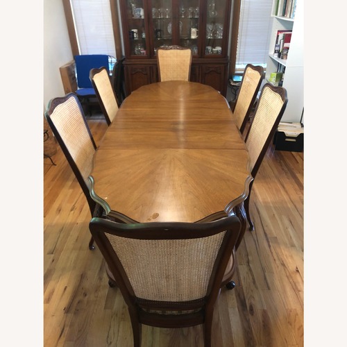Used Vintage/Antique Dark Brown Wood Dining Set for sale on AptDeco