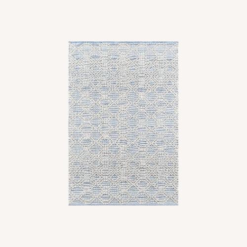 Used Pottery Barn Theros Outdoor Rug 5' x 8' for sale on AptDeco