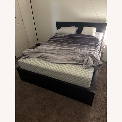 Used IKEA MALM Black Wood Queen Bed for sale on AptDeco
