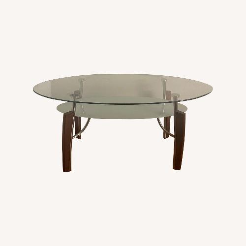 Used Dark Brown Glass Coffee Table for sale on AptDeco