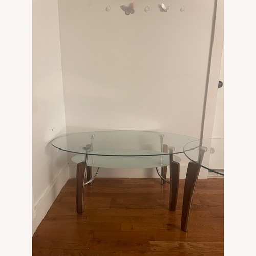 Used Dark Brown Glass Coffee Table for sale on AptDeco