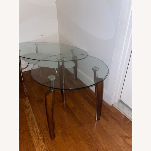 Used Dark Brown Glass Coffee Table for sale on AptDeco