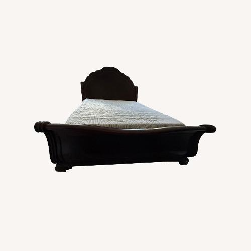 Used Macy's Dark Brown Wood King Bed for sale on AptDeco