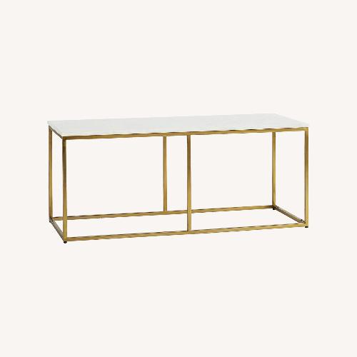 Used Pottery Barn Delaney Natural Marble Coffee Table for sale on AptDeco