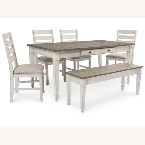 Used Ashley Furniture Dark Gray Wood Dining Set for sale on AptDeco