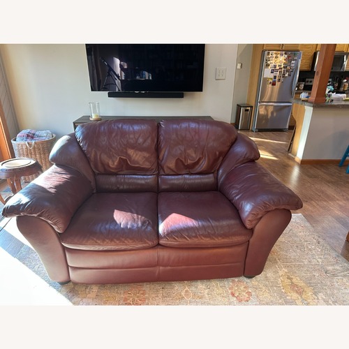 Used Vintage/Antique Dark Brown Leather Loveseat for sale on AptDeco
