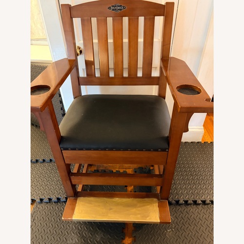 Used Vintage/Antique Finds Dark Brown Wood Armchair for sale on AptDeco
