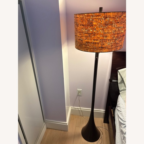 Used Dark Brown Metal Floor Lamp With Rattan Lamp Shade for sale on AptDeco