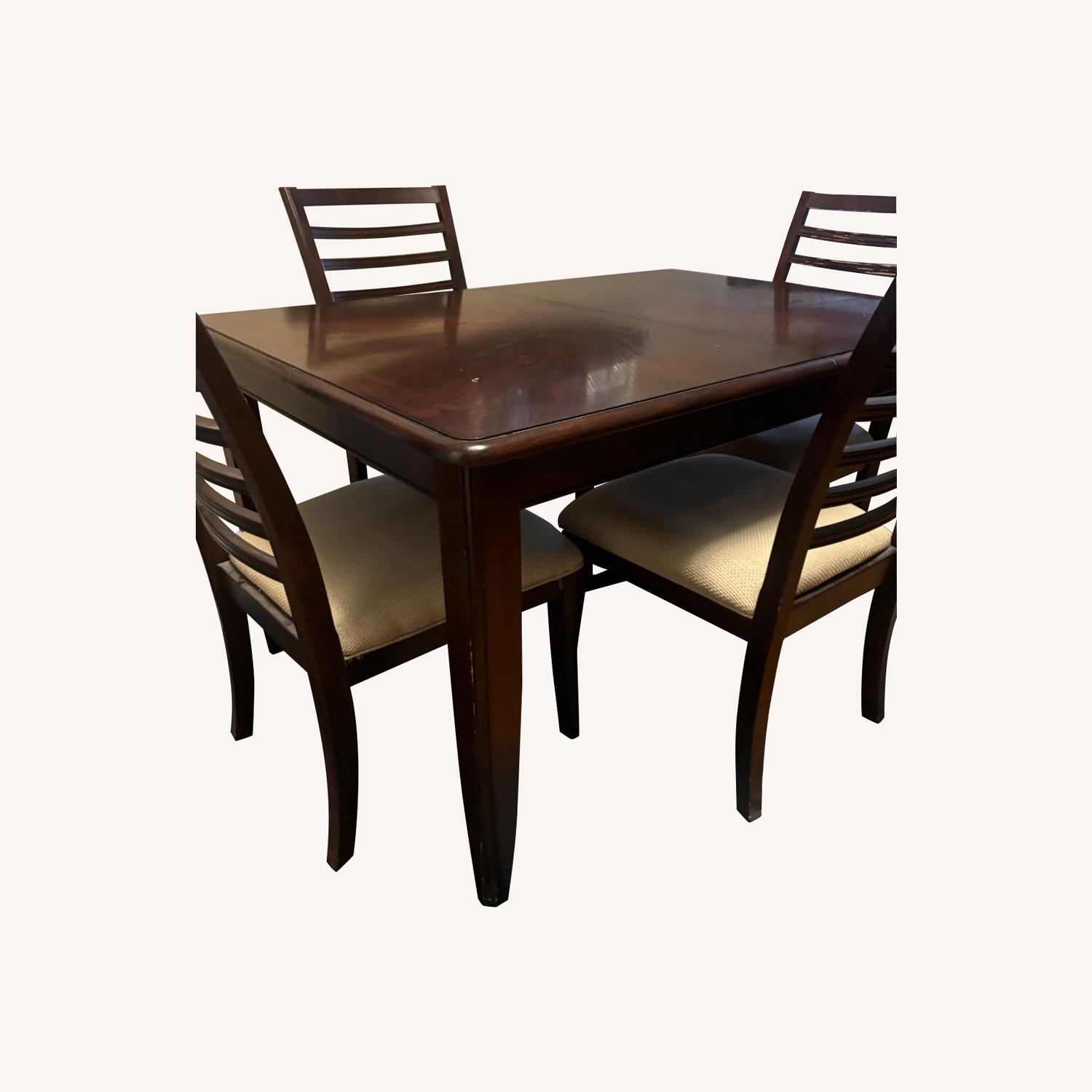 Bob's Discount Furniture Dark Brown Dining Sets - image-0