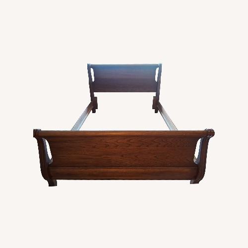 Used Vintage/Antique Light Brown Wood Queen Bed for sale on AptDeco