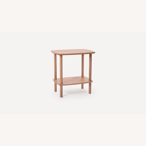 Used Burrow Serif Light Brown Wood Side Table for sale on AptDeco