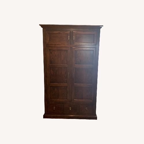 Used Vintage/Antique Natural Oak Wood Armoire for sale on AptDeco