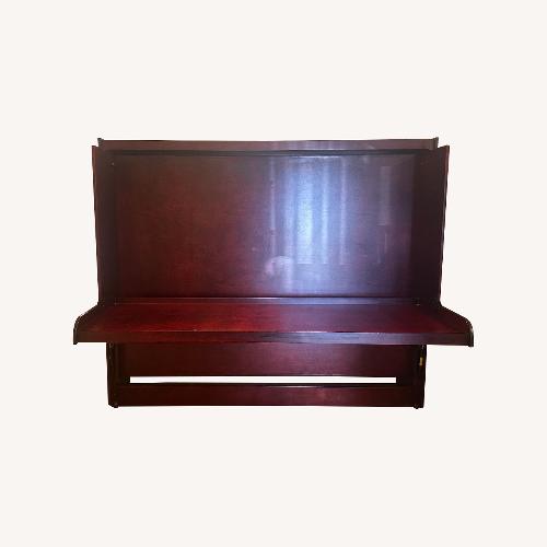 Used Dark Brown Wood Queen Bed for sale on AptDeco